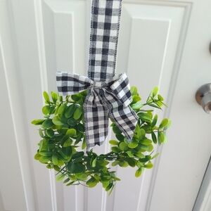 Set Of 4 Faux Wreaths with Black and White Ribbon